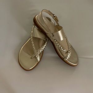 ANICA WOMEN’s LEATHER BRAIDED GOLD METALLIC THONG SANDALS.